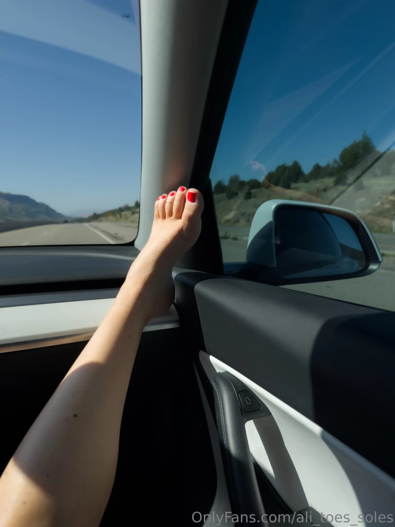 Little road trip doing my duties as the passenger to show off my toes 