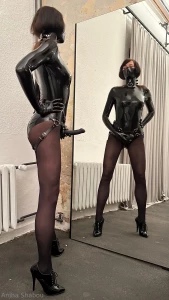 As i stand before the mirror strap-on in place my gaze speaks volumes