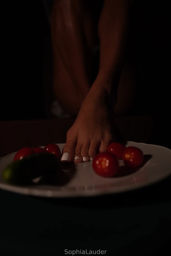 Pov i press a single tomato beneath my heel it bursts warm juice 