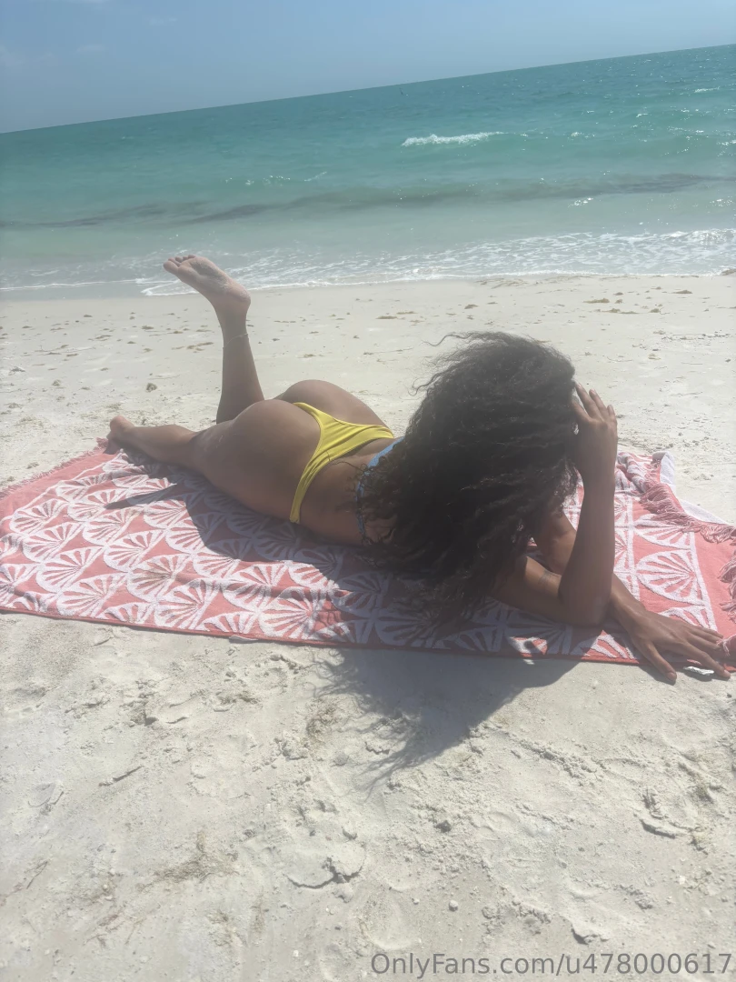 Fun day at the beach do you think you can help me get my back 