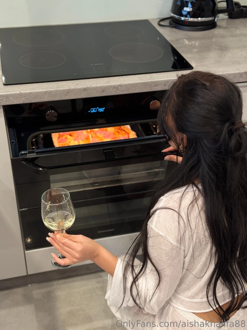I love to cook especially with a glass of wine in my hand 