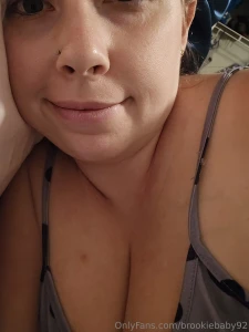 Hair bonnet and tired eyes ready for reading and sleep goodnight