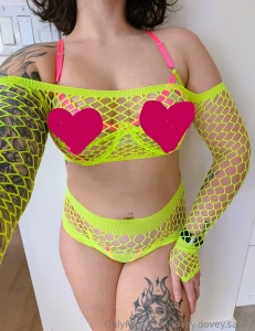 This neon lingerie set doesn t cover anything unlock to see it