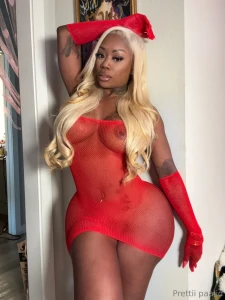 Wrapped in red and barely behaving peek through if you dare