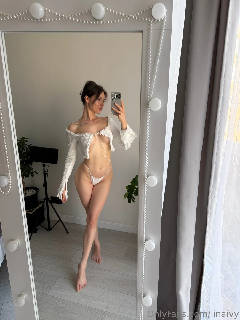 Caught a moment in the mirror - white underwear perfectly emphasizes 