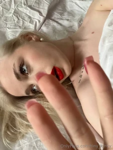 Tenderness and passion in one frame red lipstick light curls and