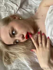 Tenderness and passion in one frame red lipstick light curls and part 1