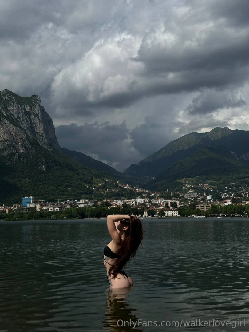 Standing in the water and behind me - the city and mountains like a 