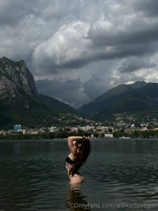 Standing in the water and behind me - the city and mountains like a