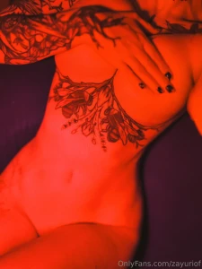Spicy implied nude photos in the red light