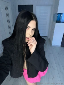 A sensual brunette her gaze filled with mystery and her smile barely