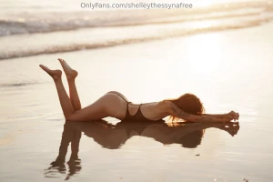 Stretching out under the sun care to join me in the sand