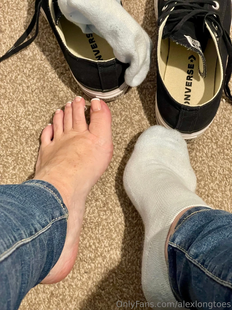 Taking my converse off after a long day at work 