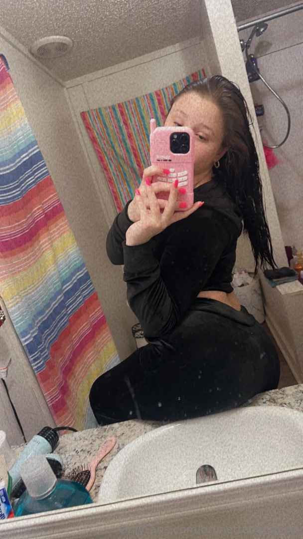 Dirty mirror but even dirtier girl behind it 