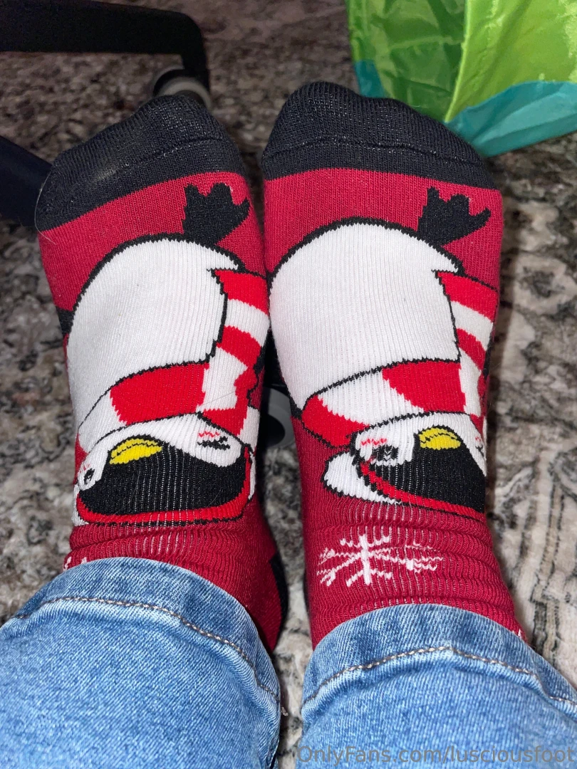 These little feet got some new christmas socks 