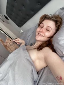 The red-haired cutie sends her regards to you after a nap and the