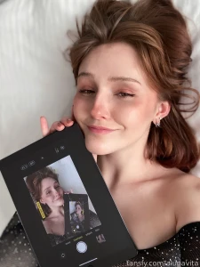 This is my ipad with phone screen dubbing my best assistant redhead