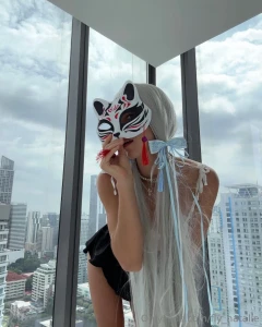 Behind the mask going to celebrate christmas at a masquerade ball what