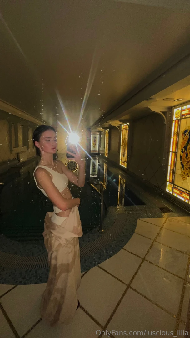 Just dim light dancing on mosaic tiles the echo of my own breath and a 