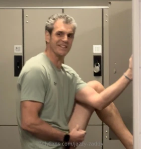 In the gym locker room again trying a new method to make the video