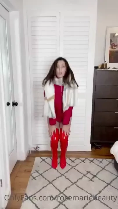 A christmas themed strip tease stripping down to just these hot shoes 