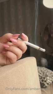 Watching my burning cigarette and the lovely thick smoke it produces
