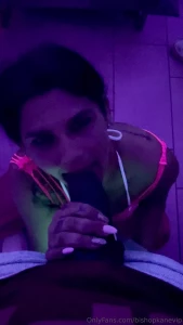 Psilo on her knees displaying her sloppy toppy skills for the whole