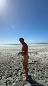 Naked backflip at the beach in slo mo
