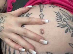 Belly button popped now we re just waiting on it to bust out