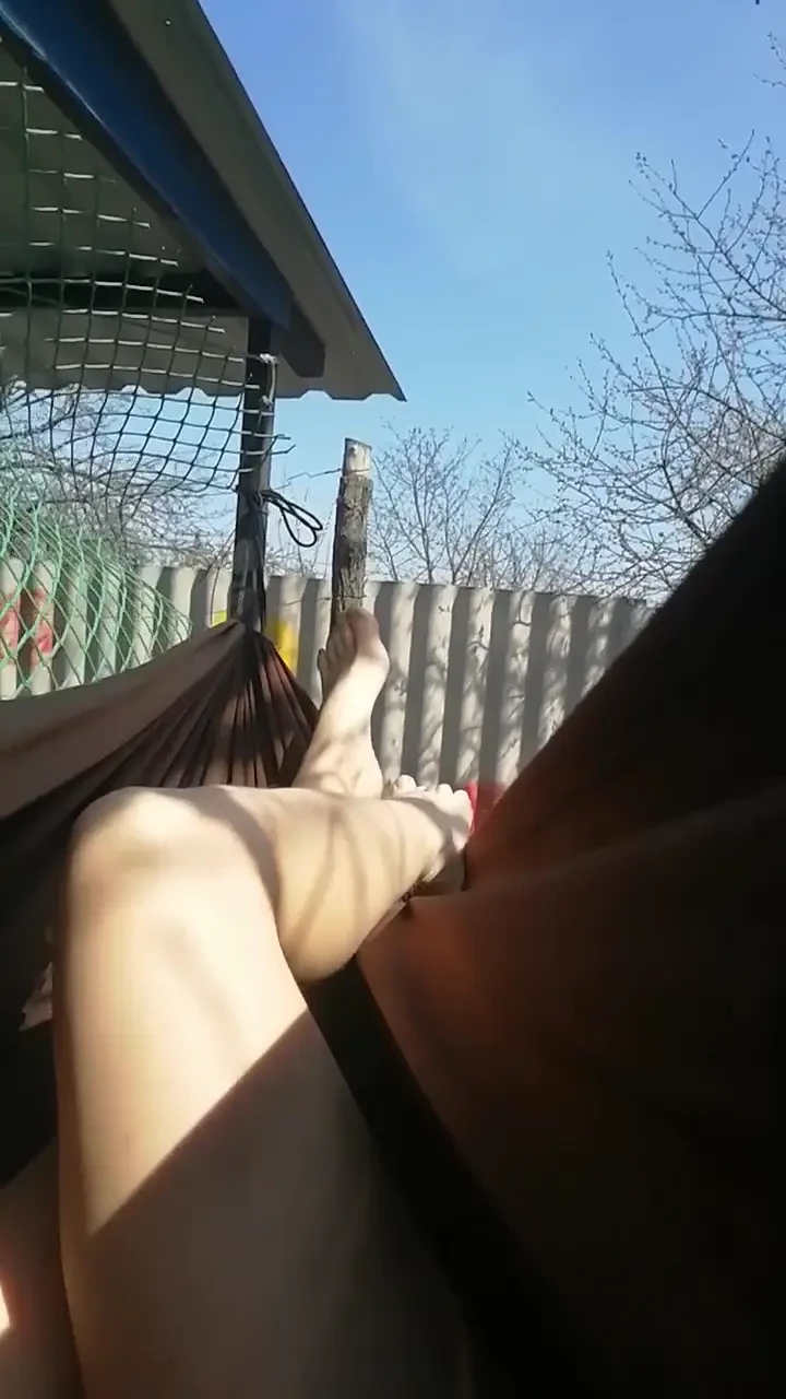The weather is so sunny and hot that i chillng naked in my hammock and 