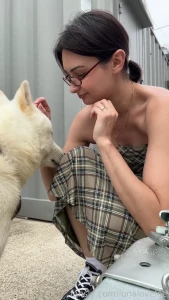 Cuddling with my furry companion in plaid brunette glasses cute