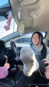 Feet content sweaty sock and shoe removal in my car post gym session