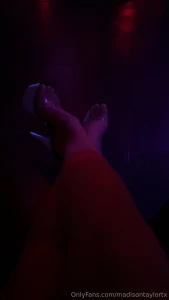 My shoes and my toes glow in the black light