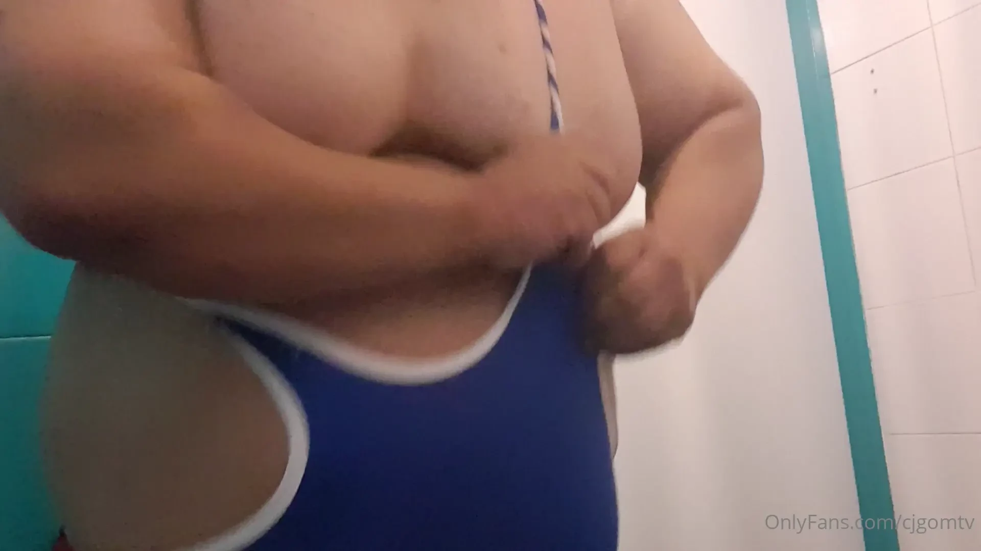 Stucking in and posing in 2xl wrestling suit 