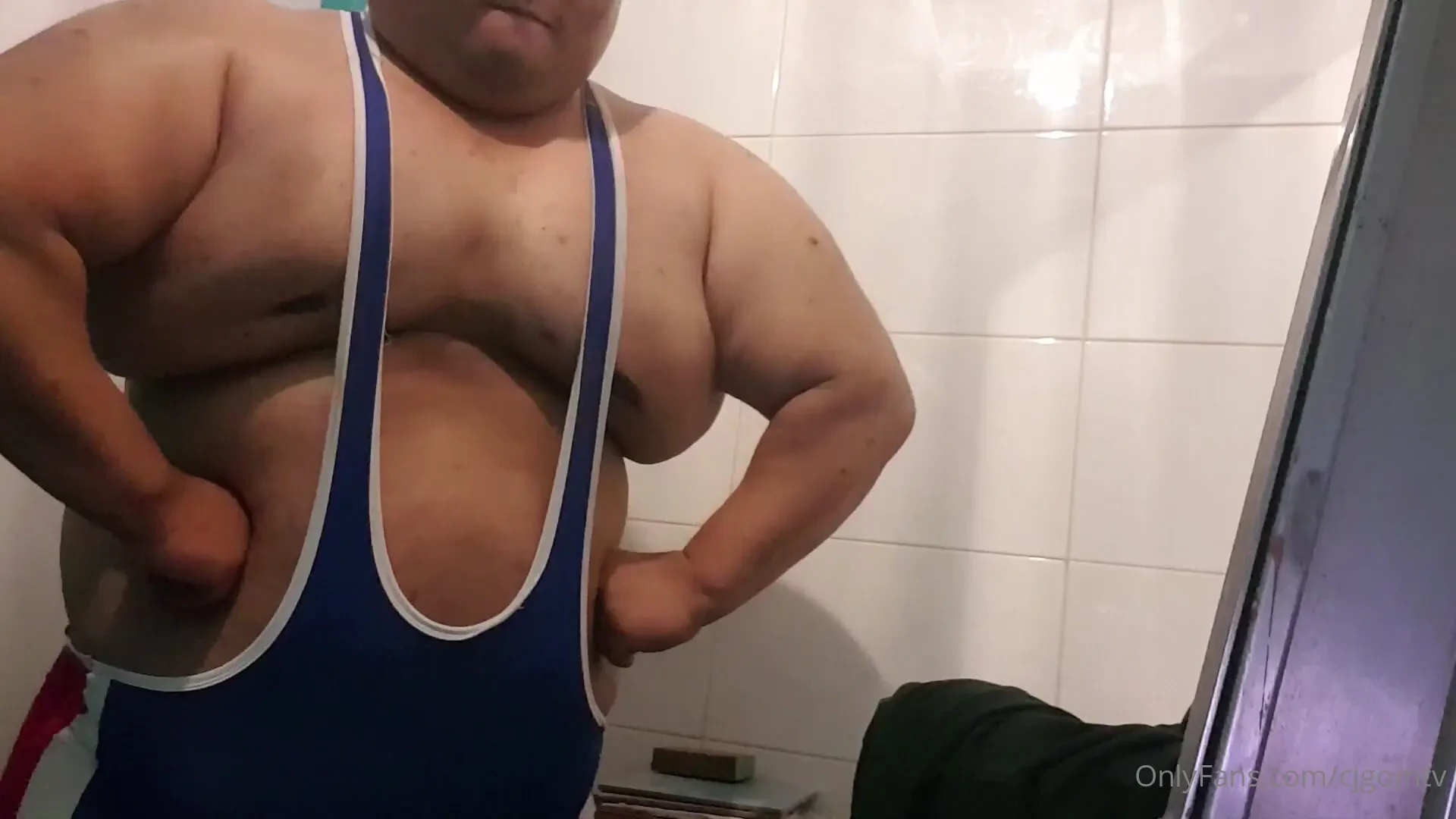 Stucking in and posing in 2xl wrestling suit part 1 