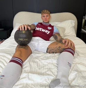 Who do you support do you fancy me in my full football kit