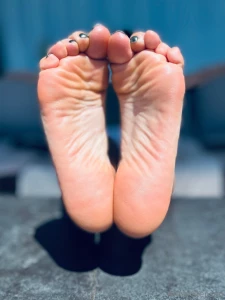 Having a chillaxing time in the sun tanning my legs and feet and ask