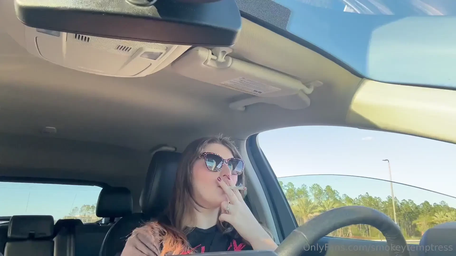 Smoking two cigarettes in a row while stuck in traffic 