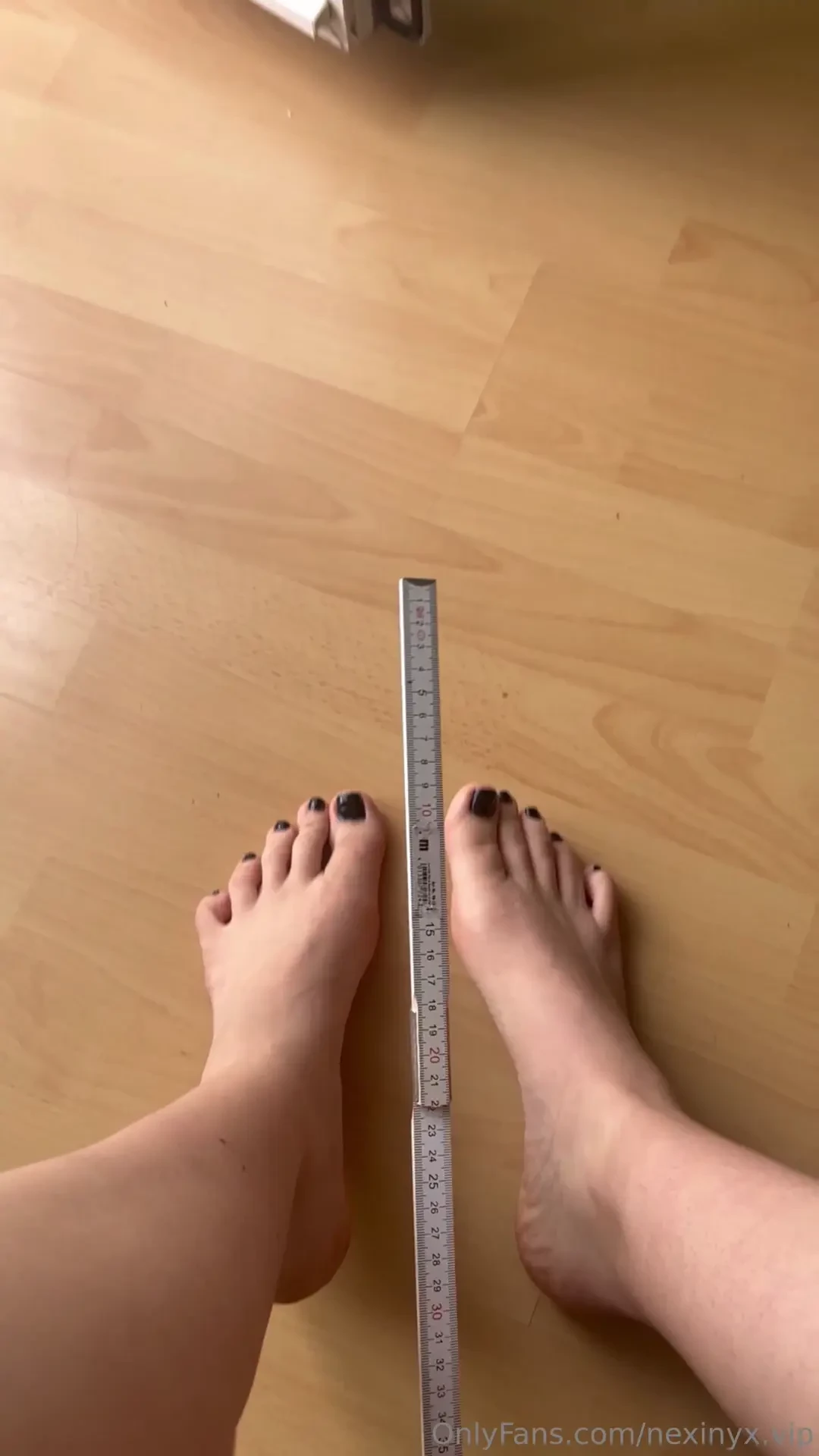 Let s measure my big feet together 