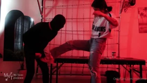 My useless gimp can barely take my ball-busting kicks standing up so
