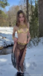 Shahirizada saw snow got very excited and started touching her pink