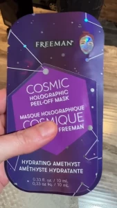 Rubbing iridescent peeloff face masks all over my boobs and trying out