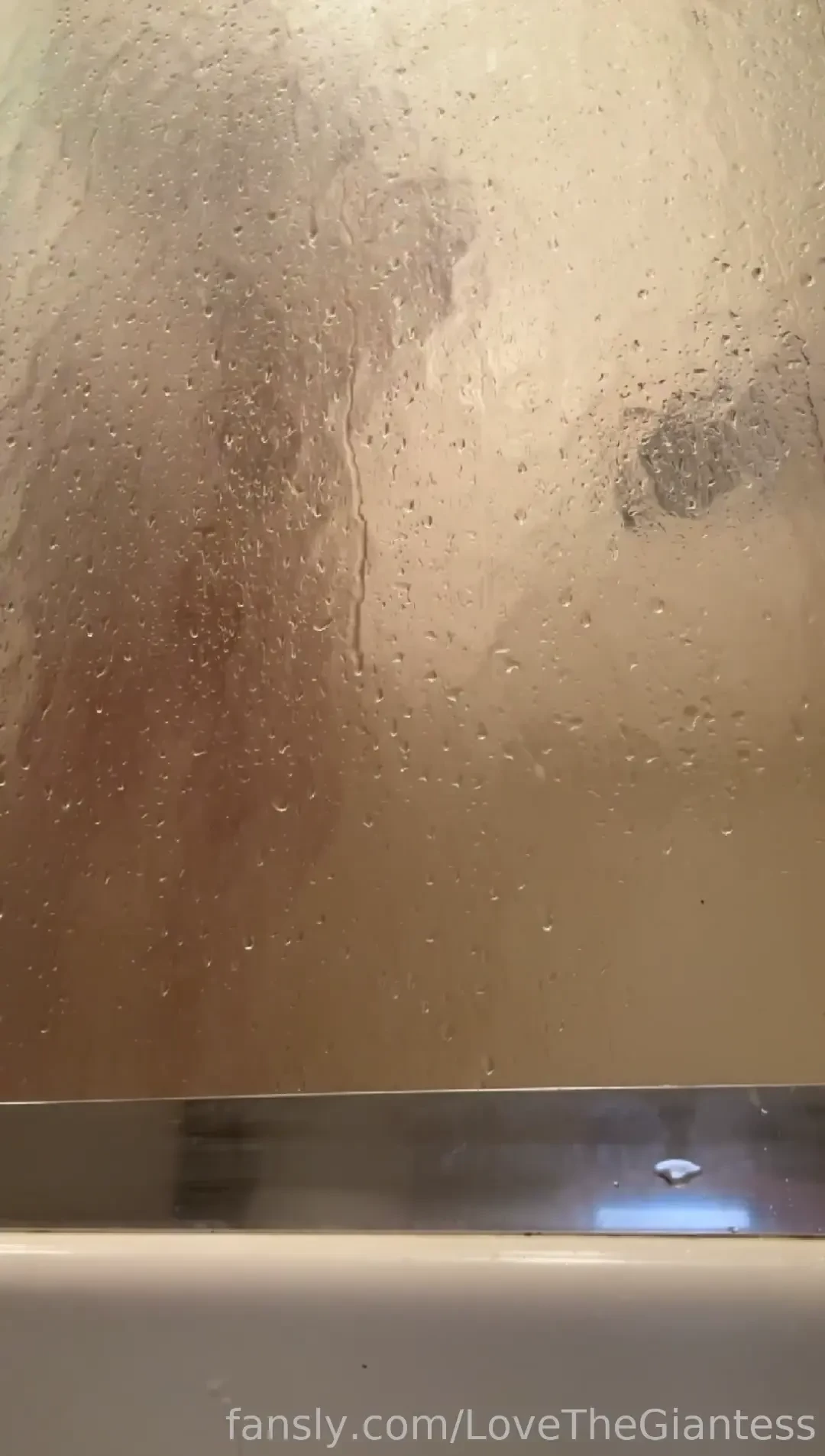 Giantess was taking a shower little did she know 