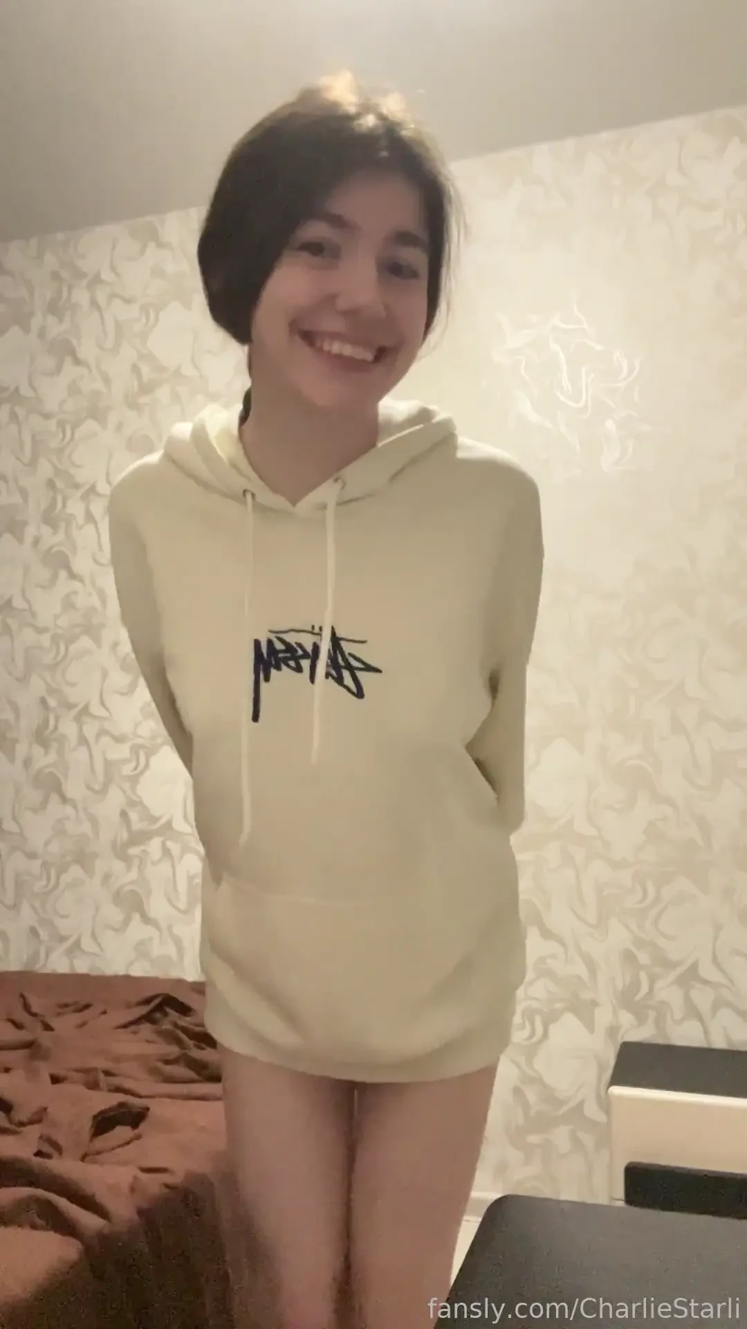 Just a girl in a big hoodie nothing to see here except maybe a little 