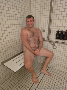 Washing off last nights oiled up jerk fest