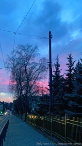 The evening city freezes under the delicate colors of the sunset at