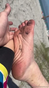 Look at maxy admiring how stinky and perfect my feet are at the beach