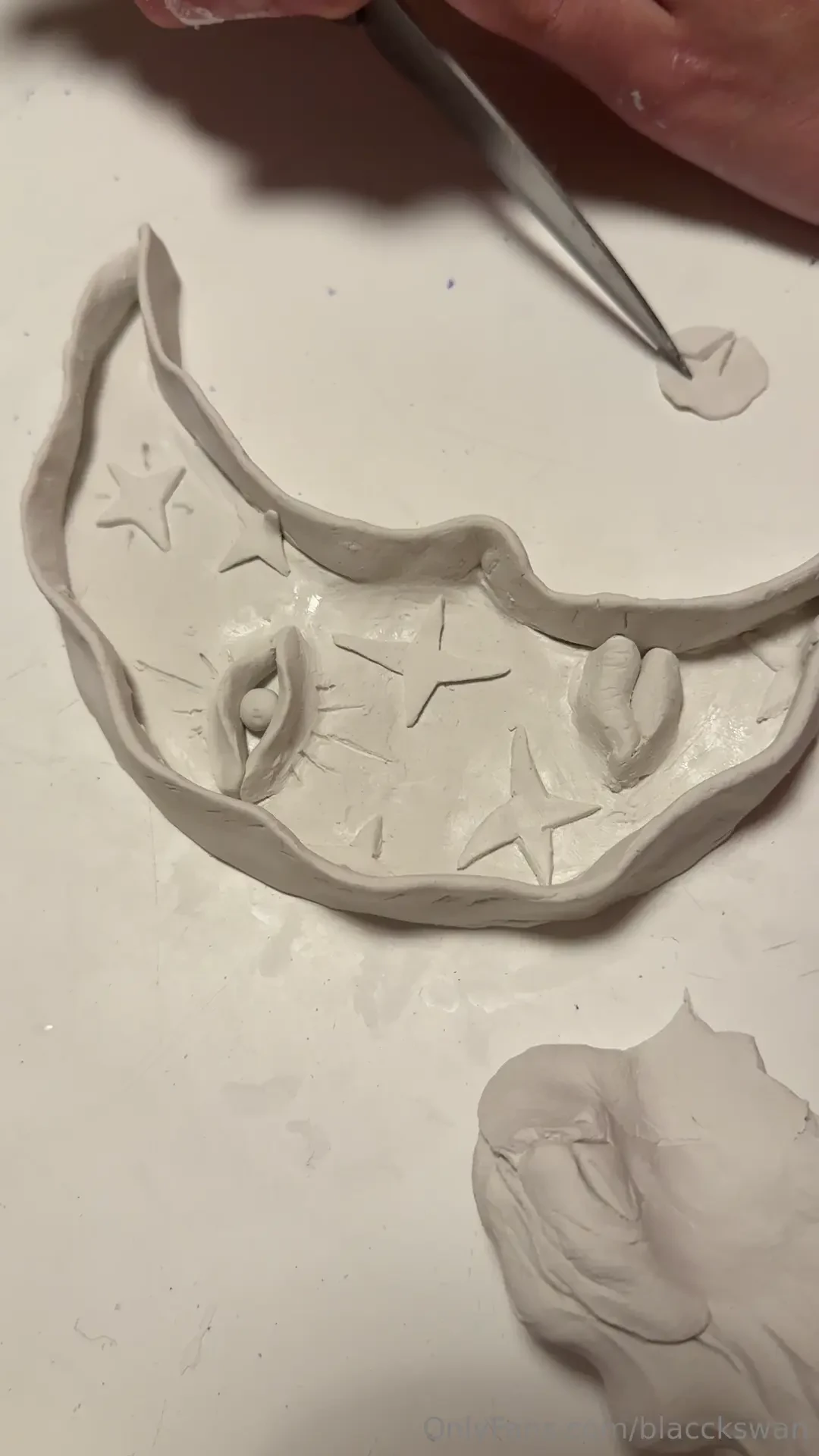 I really enjoy doing needlework especially modeling with clay - it s 