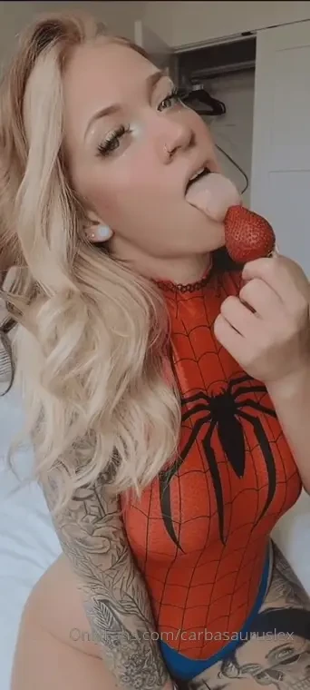Watch me suck on this sweet little strawberry before i rub it on my 