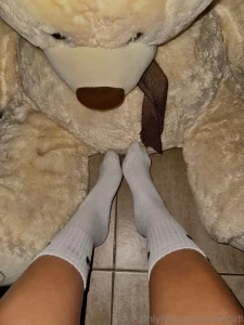 My feet in socks tender and small